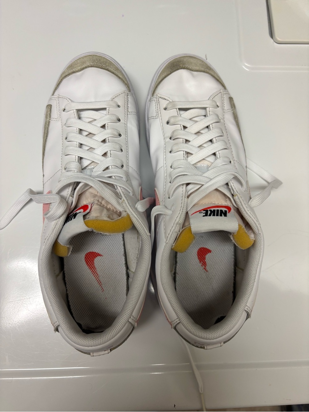Nike White Leather Sneakers with Pink Swoosh